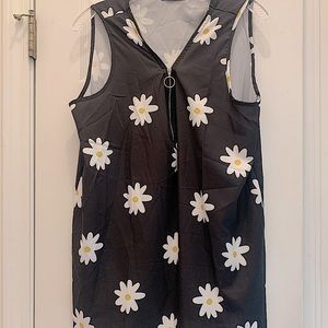 Blue sleeveless top with yellow and white flowers. Size XL, made by MISSLOOK